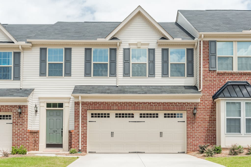 Brand new townhome with covered 2-car garage