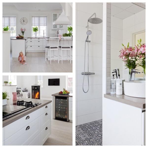 The kitchen features modern white cabinetry, a central island, and a dining area with white chairs. Natural light floods the space, illuminated by large windows with potted plants. A bathroom is shown with a walk-in shower and floral decorations, accentuating the clean lines and neutral tones.