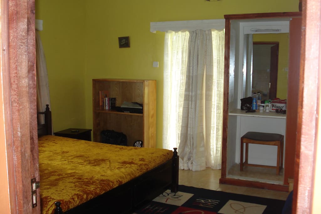 Master bedroom and one smaller bedroom en-suite, and a third bedroom with adjacent full bath