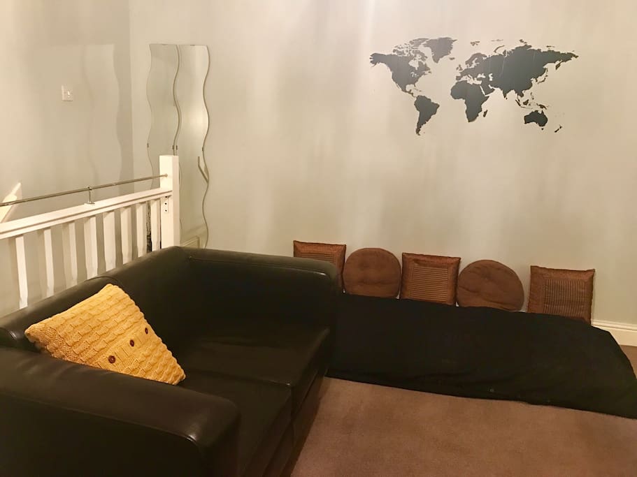 Couch to relax on the mezzanine and the mattress