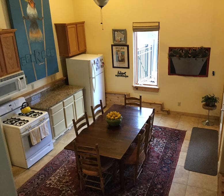 The kitchen table expands to seat 10 people.