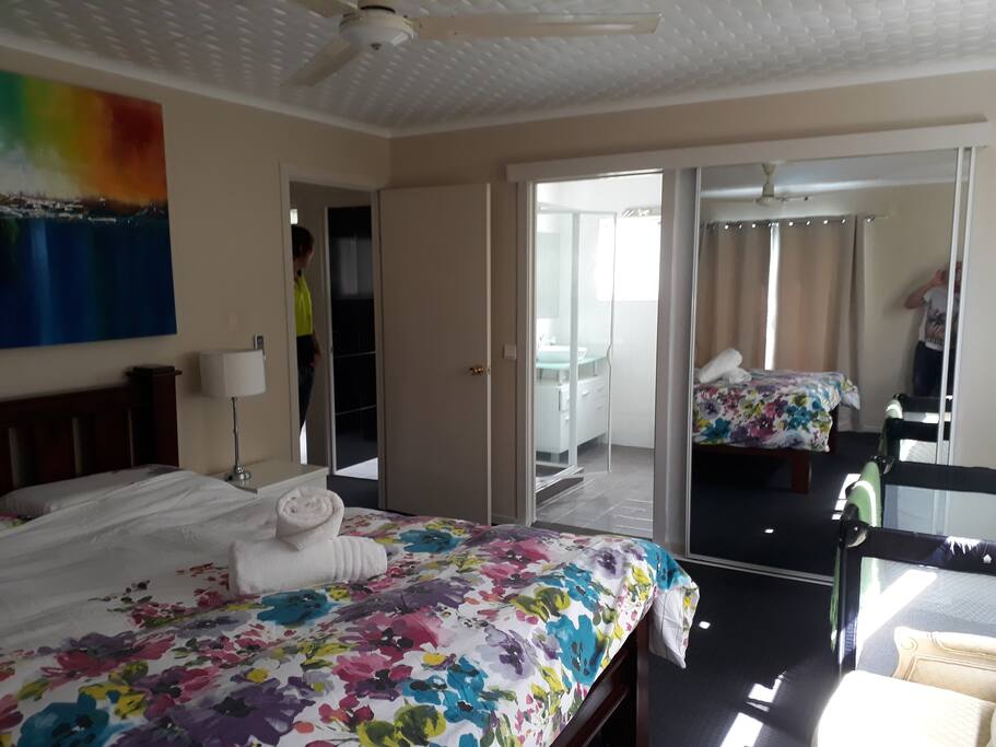 Master Bedroom with walk in wardrobe and ensuite shower and
Air Con.