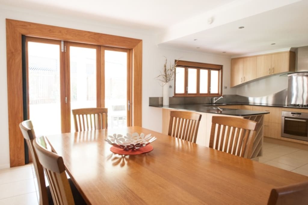 Enjoy meals together at the large dining table.