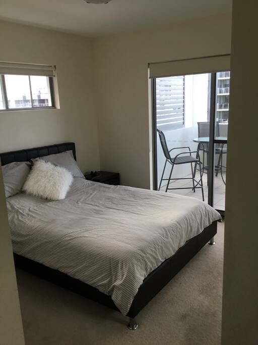 Second bedroom with own balcony.