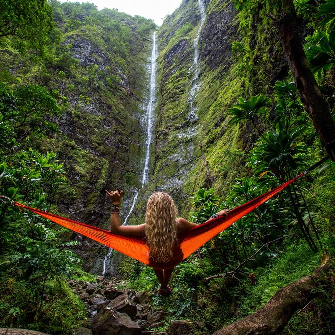 Girl on hammack at waterfall