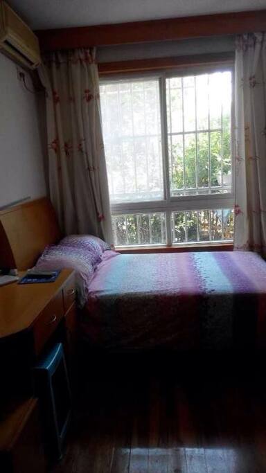Clean bed, relax space, you can have a nice view through the window