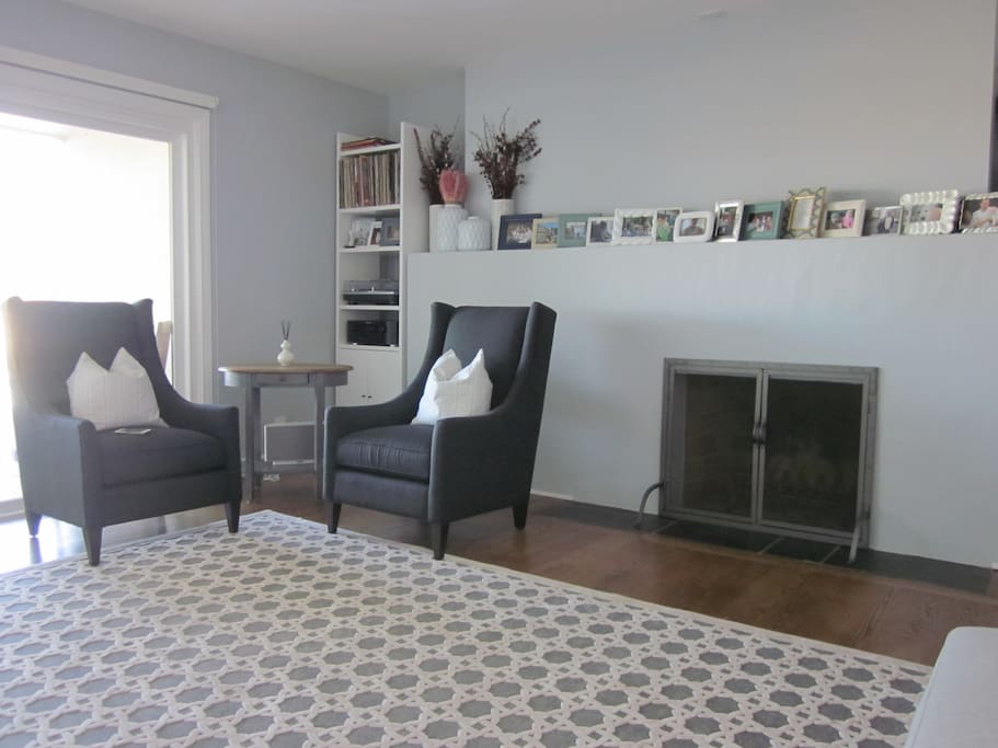 Living room (2) - with fireplace, surround sound stereo system, & turntable