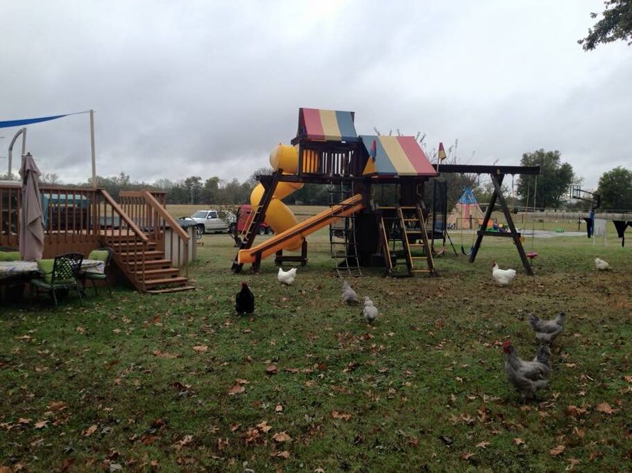 King Size Play Yard with additional teeter totters and double power jump trampoline with safety net