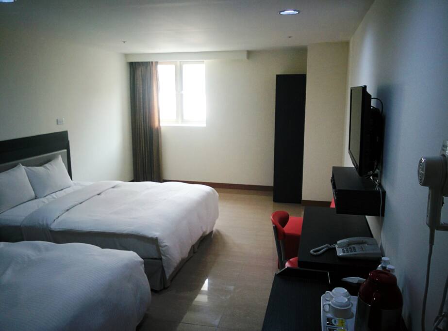 brightly lit room with window