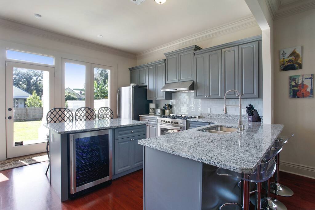 Well Furnished Kitchen with refrigerated wine cooler, dishwasher, refrigerator/freezer with ice maker, 5 burner stove and oven--all new appliances.