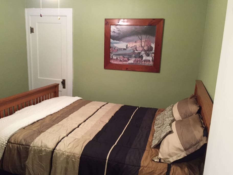Bedroom with queen sized bed.