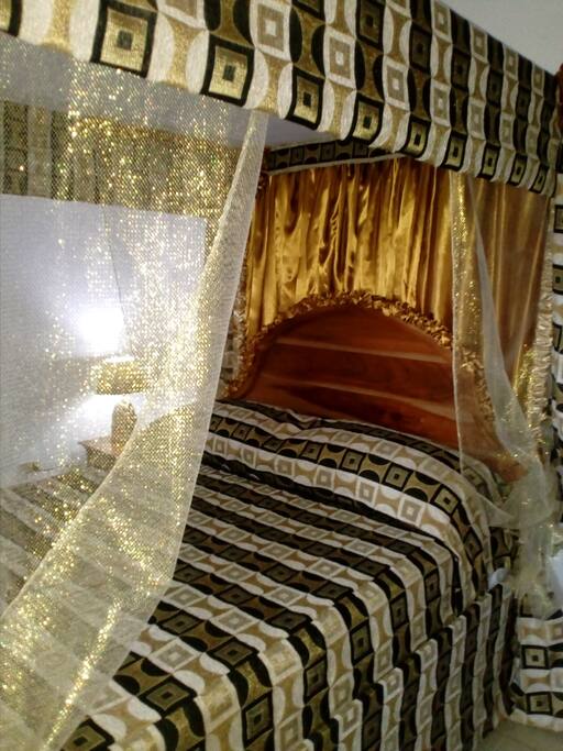 Queen size beds beautifully appointed