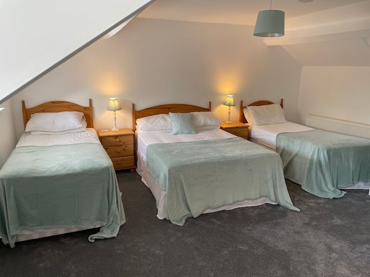 The first floor, bedroom 2 sleeps 4, I x double 2 x single.