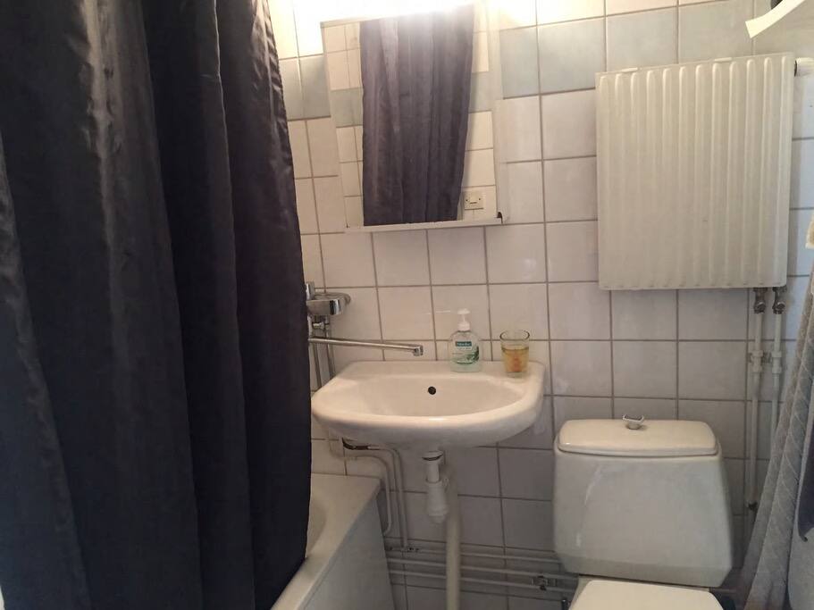 Bathroom with bathtub.