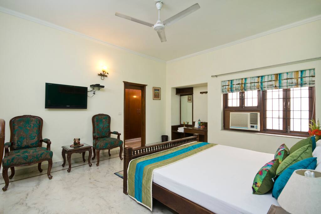 Another view of the master bedroom. The large bungalow style windows letting in ample sun light..