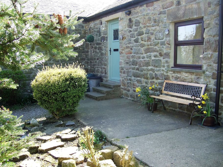 Enjoy a cuppa in the garden - this corner is a real sun trap all morning.