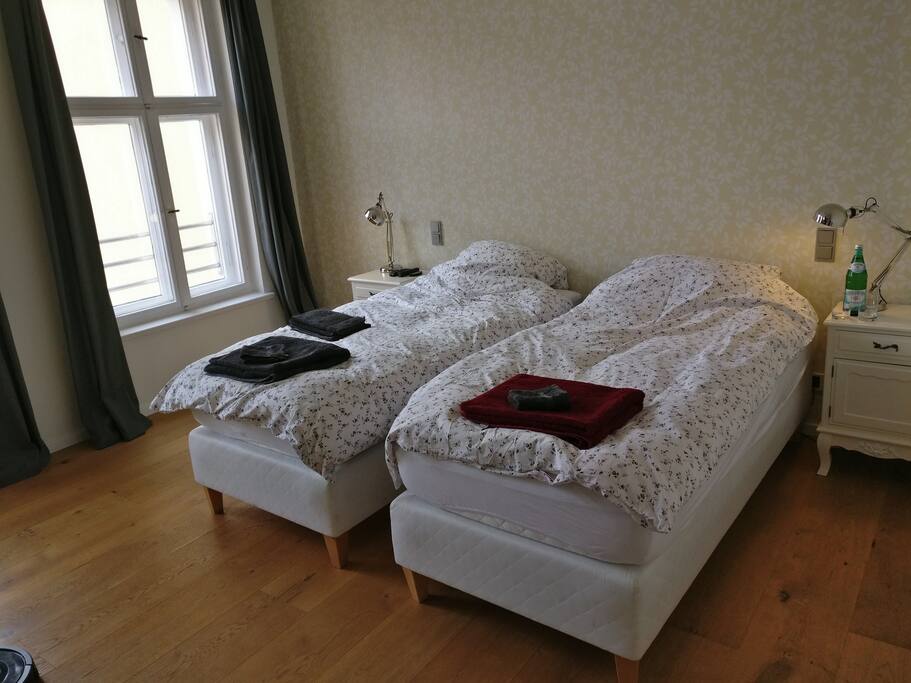 Room set up with 2 single beds