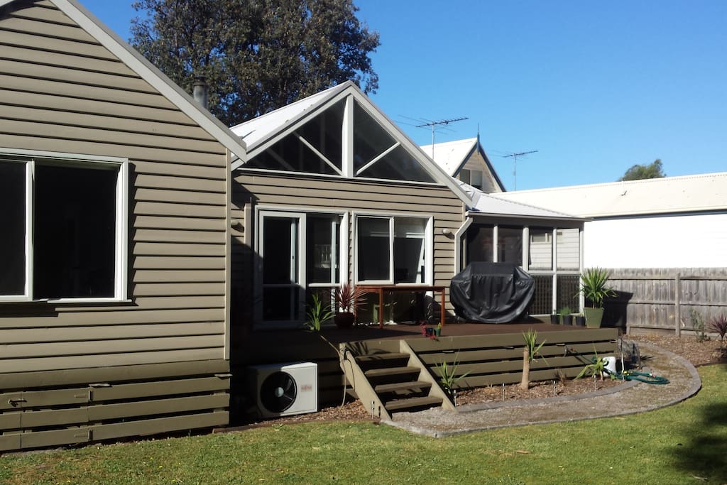Great deck with afternoon sun. Also outside dining area enclosed with fly wire