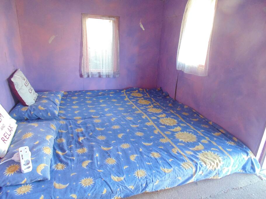Bed on floor in hut for 2. Single bed if you are one