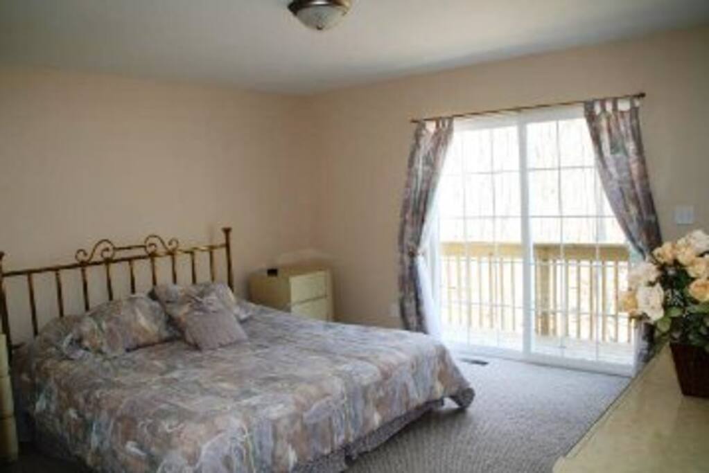 Bedroom 1- Master on main with bathroom suite. King bed.