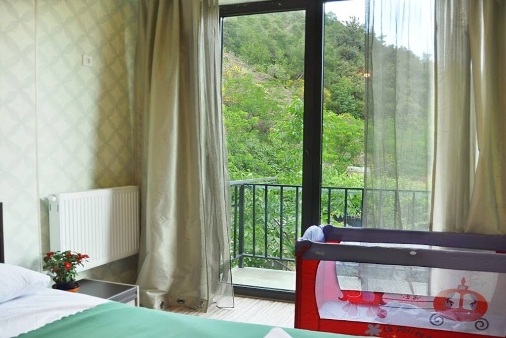 Bedroom 1- Baby Cot