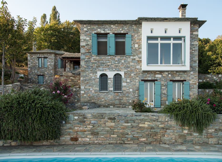 Stone built villa is a complex of two houses