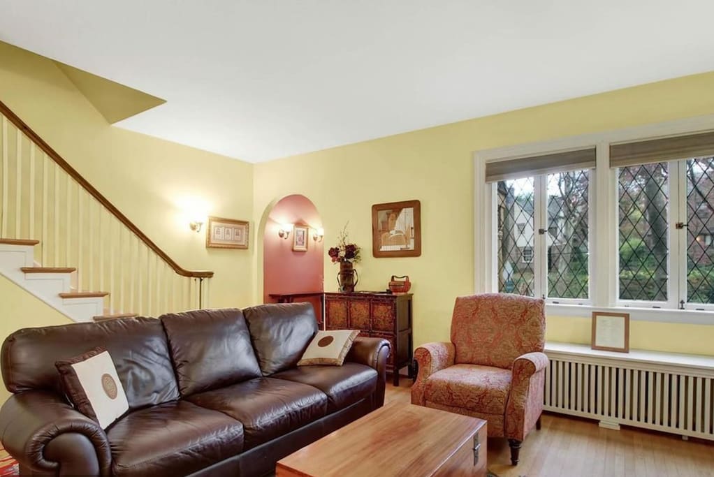 Living room looking out onto tree-lined street voted "prettiest in Baltimore."