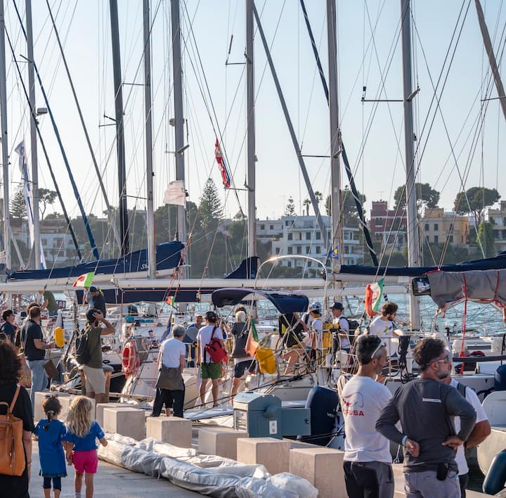 image of people near boats