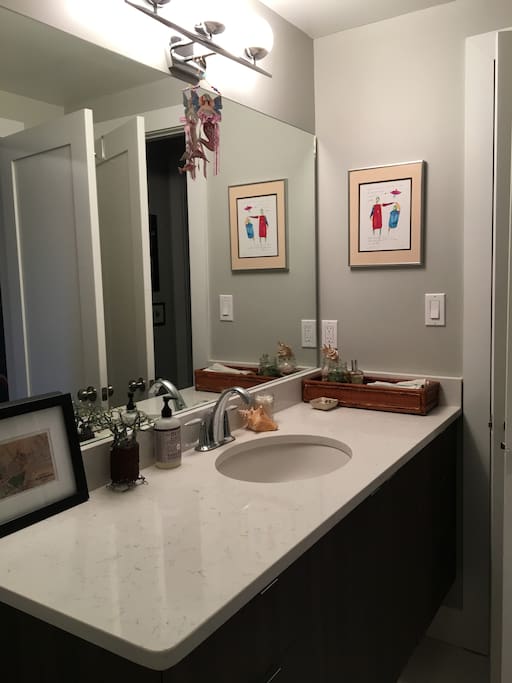 Private bathroom with tub.