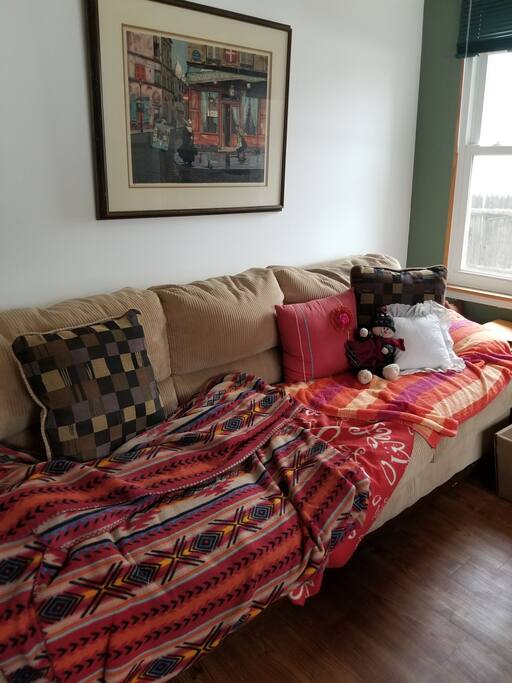 my cozy corduroy couch in my beautiful family room with view to my entire backyard.