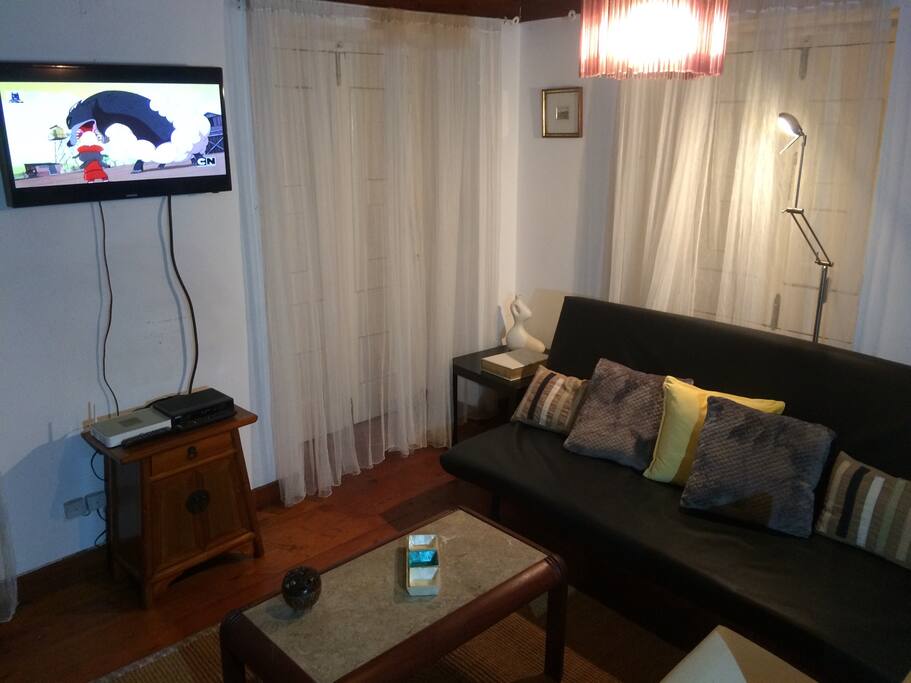 Sala com sofá cama para 2 pessoas