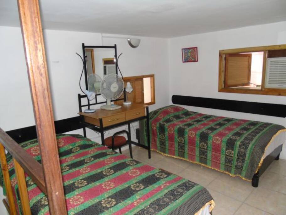 it is a simple space but comfortable, it is suitable for a couple or friends..beds can be put together
