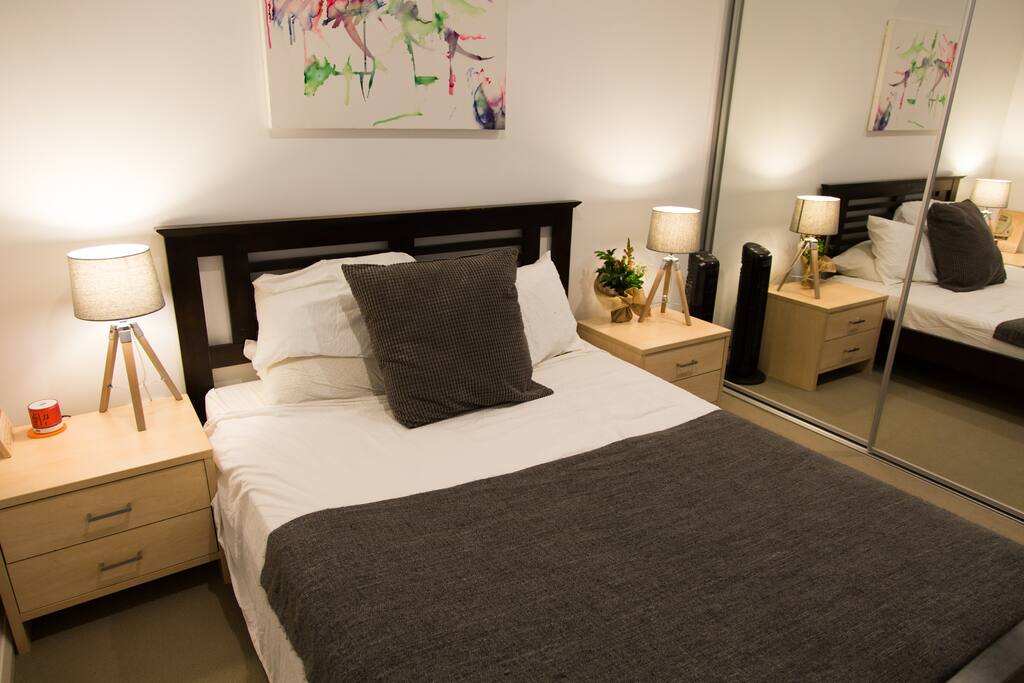 Your private bedroom; a queen size bed, table lamps, bluetooth speaker, full wardrobes.