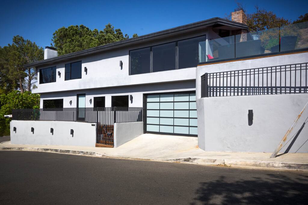 The home is gated and private, located at the end of a dead-end street, abutting a nature preserve.