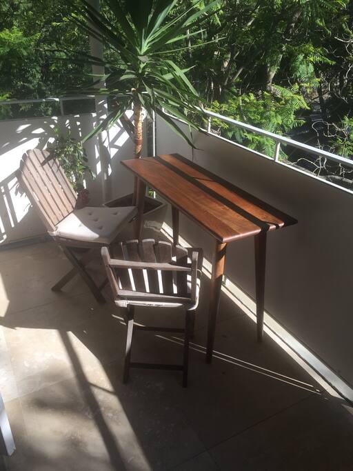 Outdoor breakfast area on large balcony