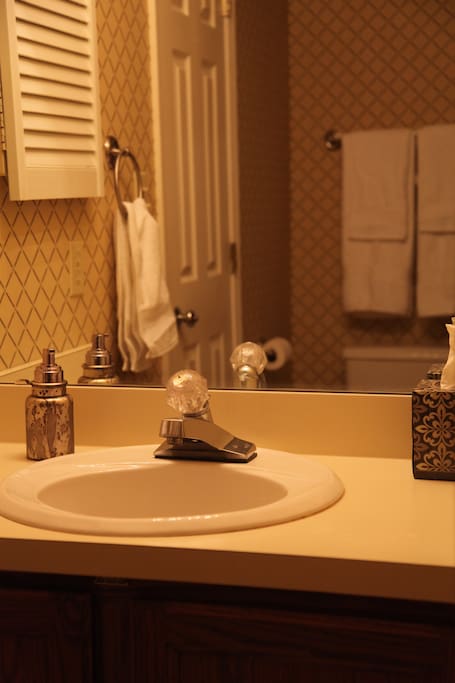 Private Ensuite Bathroom with Essentials (Towels, Shower Gel, Shampoo, Conditioner, Hand Soap, Facial and Toilet Tissue)