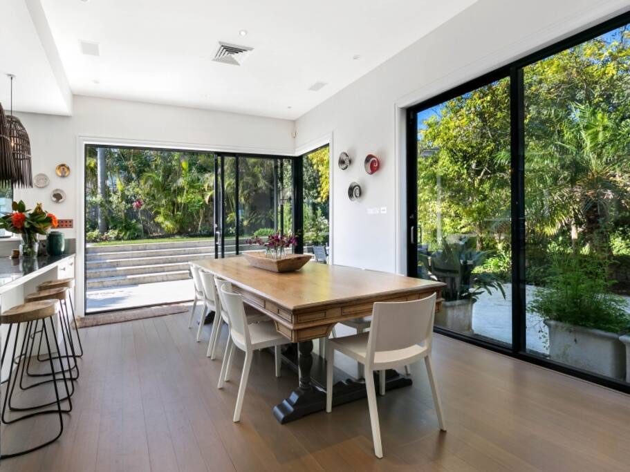 Open plan light and airy dining adjoining the kitchen