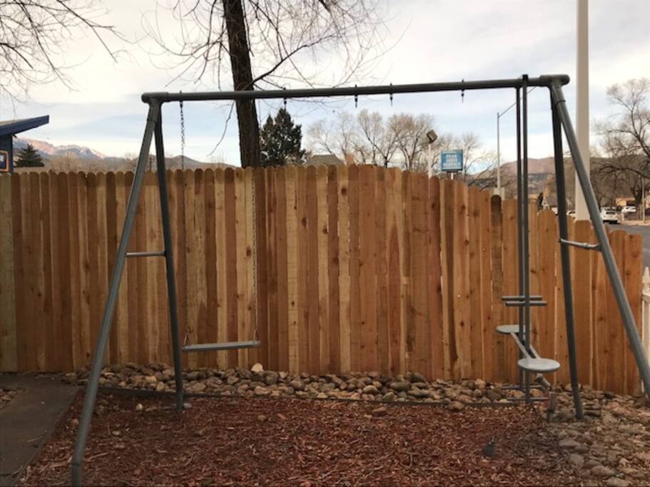 Swingset w/fenced front yard.