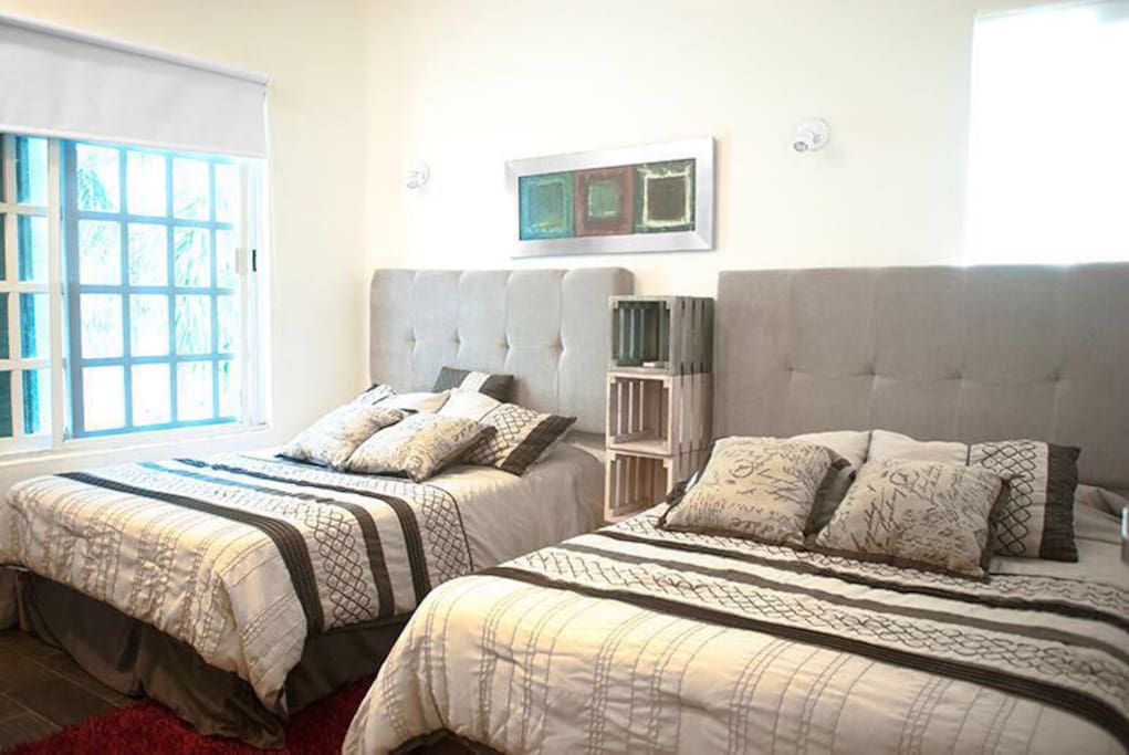Habitacion con 2 camas matrimoniales