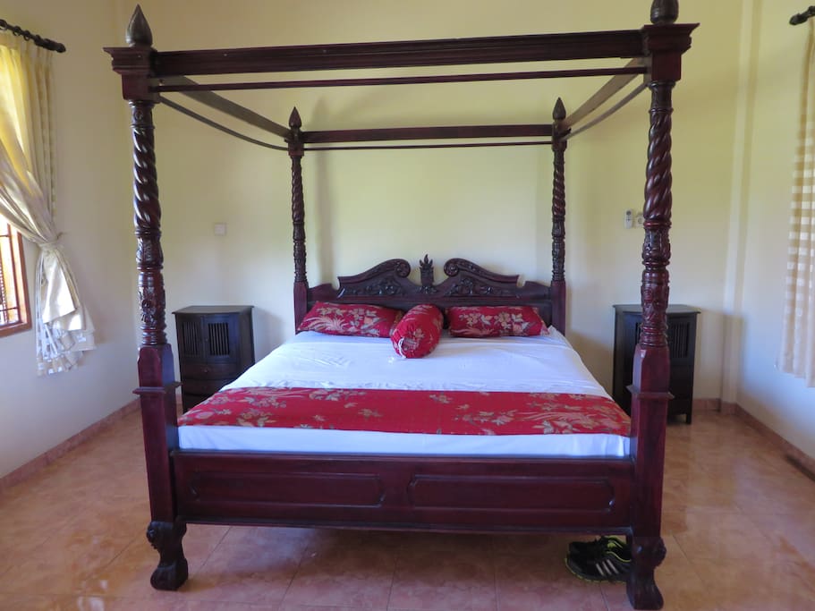 Two large bedrooms, both with king-sized beds, fans and air-conditioning