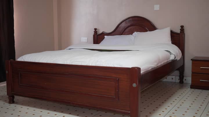 Large comfortable Queen-size bed ideal for two persons.
