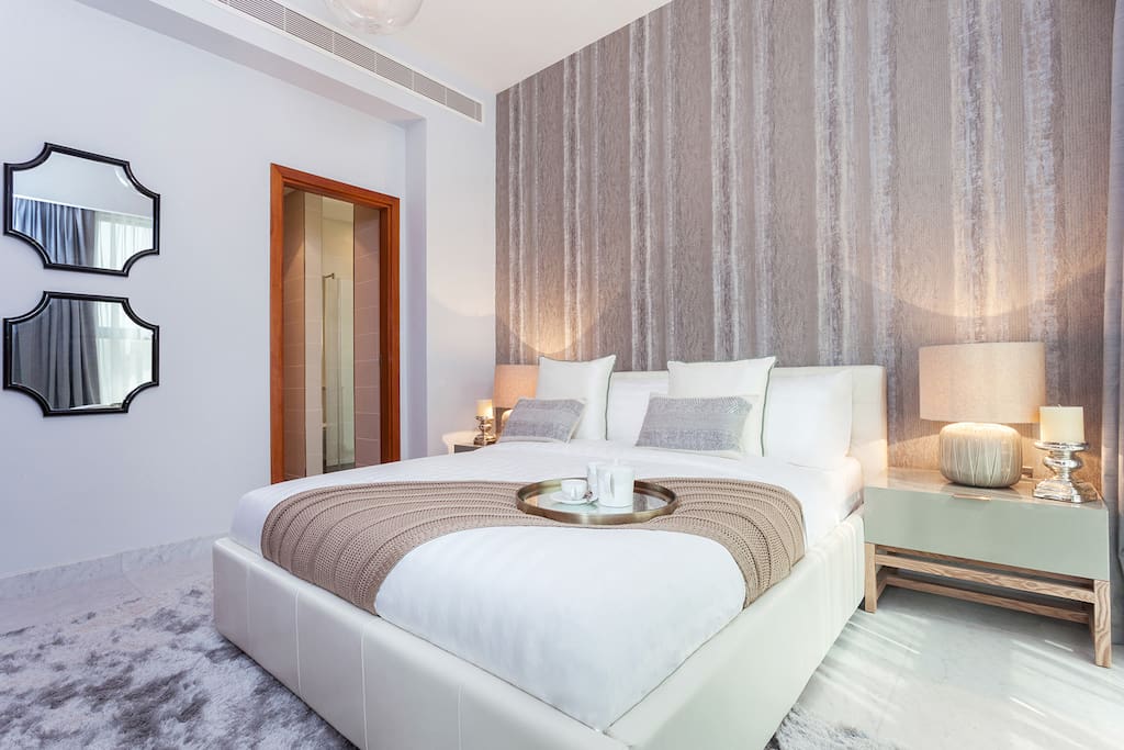 Stunning bedroom with beautiful views of Dubai