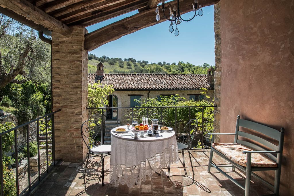 Il Molino's covered terrace - an ideal breakfast spot in the sun