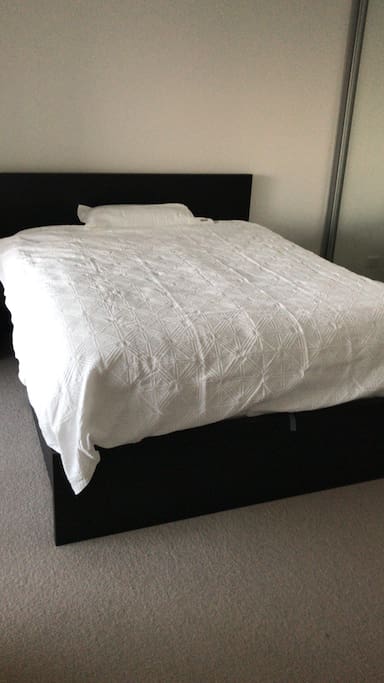 Bed with large wardrobe