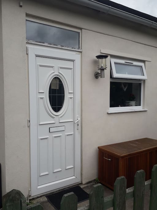 Independent entrance from patio garden area