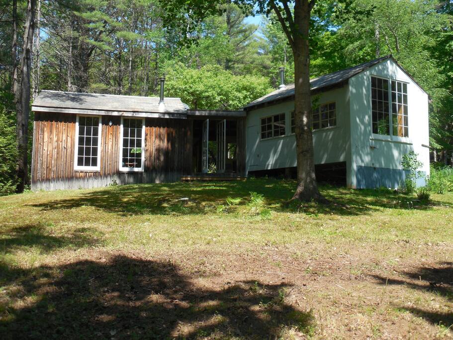 Living area on the left / entry in the center / studio on the right
