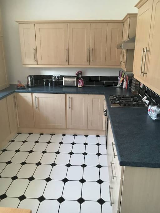 Kitchen fully equipped including washer dryer.