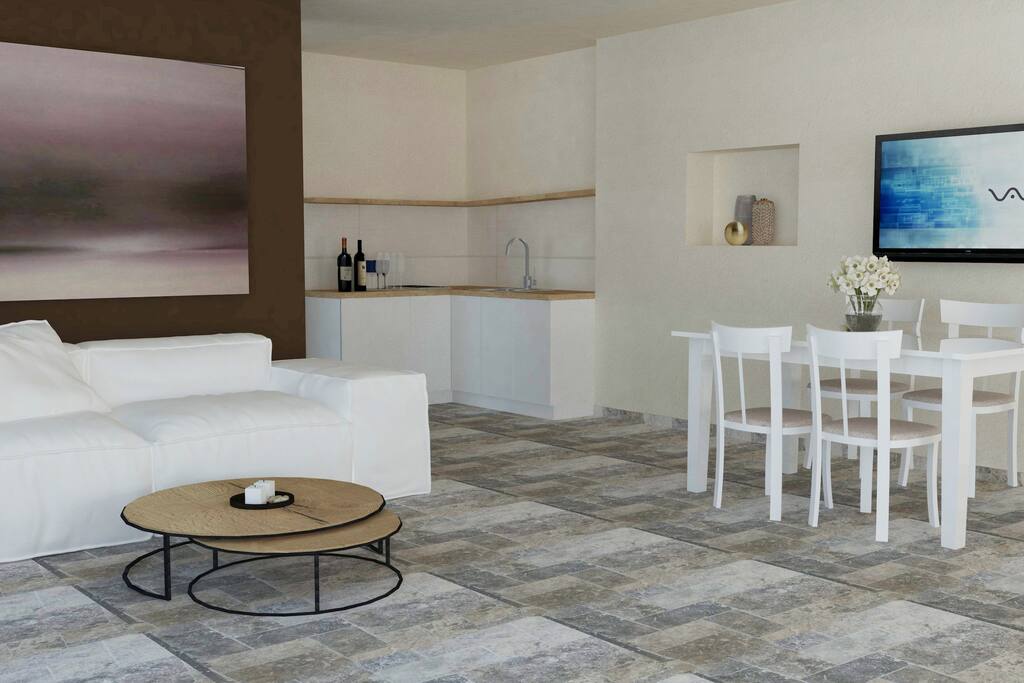 In the living room there is top luxury furniture. Equipped with a comfortable sofa, flat screen TV with cable television, table with chairs, Wi Fi connection, mini bar and air conditioning.