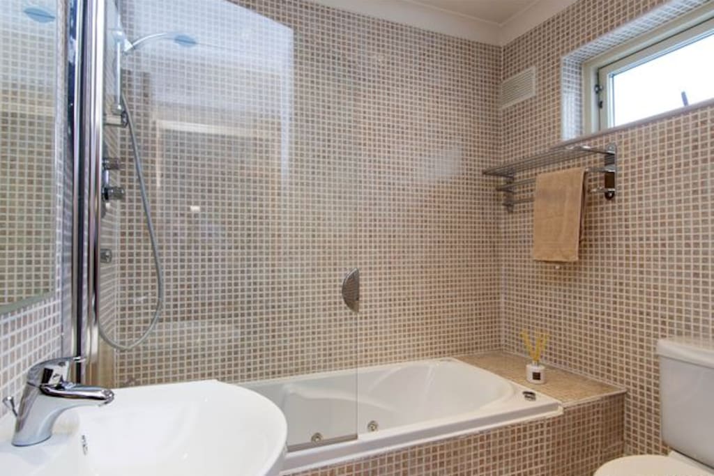 You have access to a private bathroom with a shower & jacuzzi bath