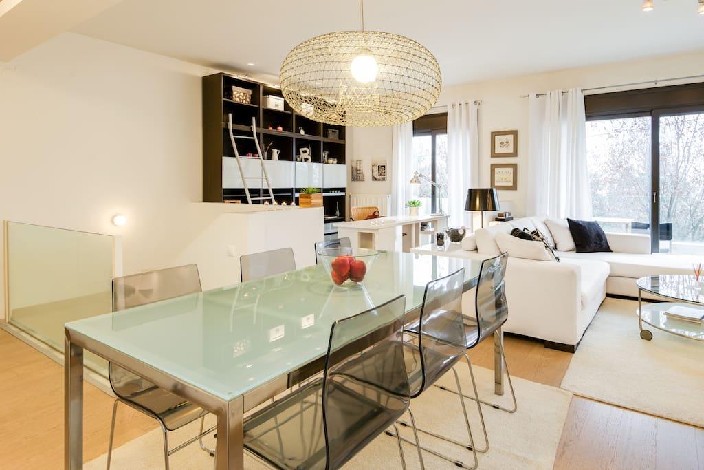 Spacious living room with dinning area and laptop friendly working space
